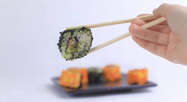 Sushi rolls z białej laski. Kuchnia Japońska. — Zdjęcie stockowe