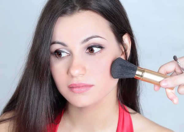 Closeup. beautiful woman with brush for makeup — Stock Photo, Image