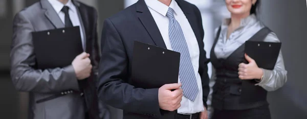 Close up.a group of business people with clipboard — Stock Photo, Image