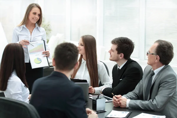 business woman conducting a presentation for business colleagues