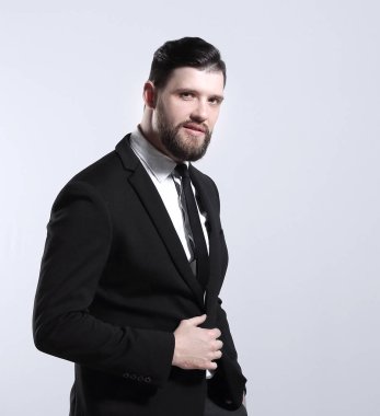 gri arka plan üzerinde ciddi bir businessman.isolated yan view.portrait