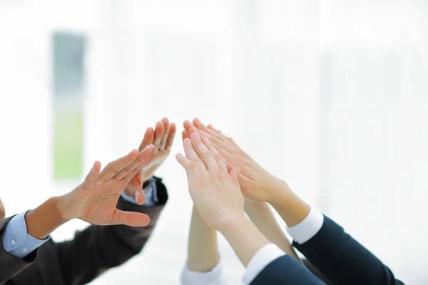 Closeup.business team giving each other a high five. — Stock Photo, Image