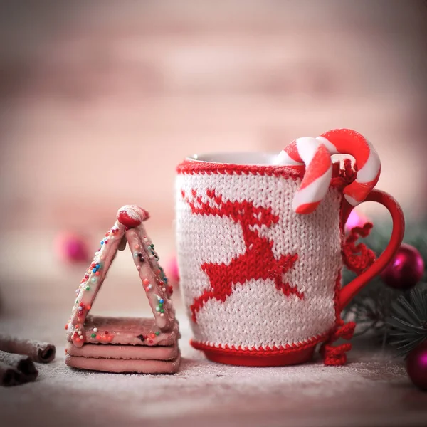 Christmas Cup ornament and homemade pastries on a wooden table — Stock Photo, Image