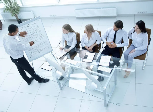 Top view.business team at presentation of a new financial project. — Stock Photo, Image