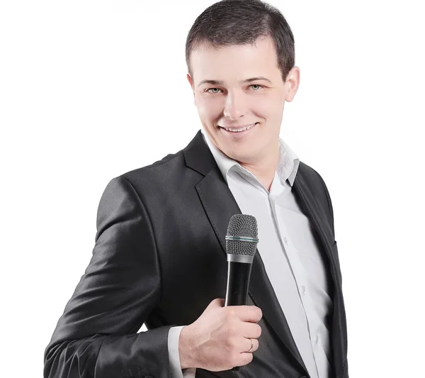 Orador jovem com um microfone.isolated no fundo branco — Fotografia de Stock
