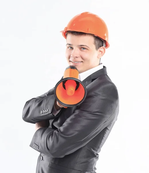 Junger Ingenieur mit Megaphon. Isoliert auf weiß — Stockfoto