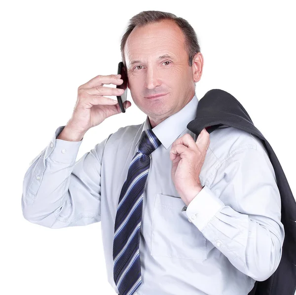 Poważny biznesmen rozmawiający przez telefon komórkowy — Zdjęcie stockowe