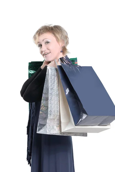 Vacker kvinna med shoppingkassar .isolated på grå bakgrund. — Stockfoto