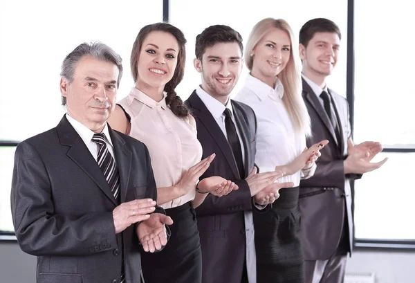 Successful business team applauding at the office — Stock Photo, Image