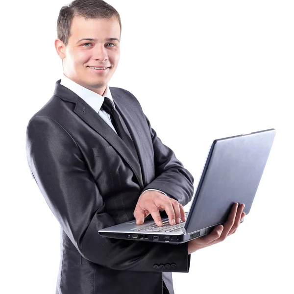 Бизнесмен с ноутбуком. Изолированный на белом фоне . Стоковое Изображение