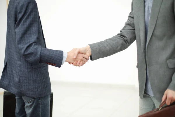 Close up.handshake of two business people before the business me — Stock Photo, Image