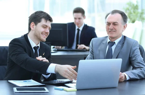 Employees working with financial documents in the office — Stock Photo, Image