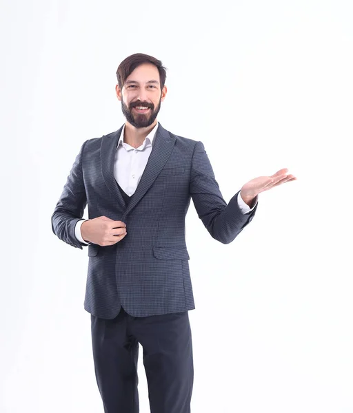 Homem de negócios em terno mostrando um espaço de cópia. isolado em branco — Fotografia de Stock