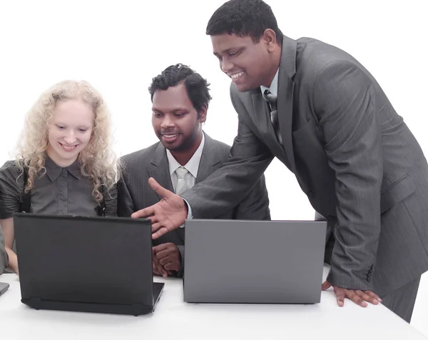 Successful business team discussing the information with the la — Stock Photo, Image