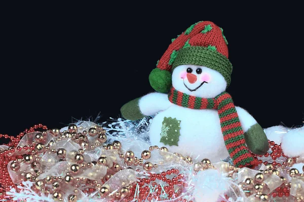 Bonhomme de neige festif avec Noël dans le fond de la lumière — Photo