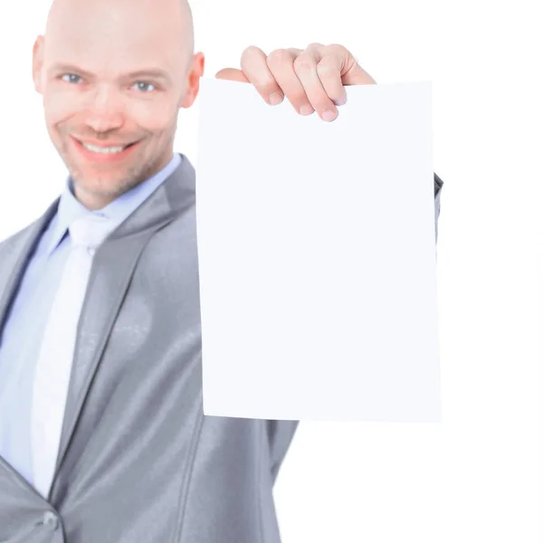 Nice businessman holds white poster. Isolated on a white background. — Stock Photo, Image