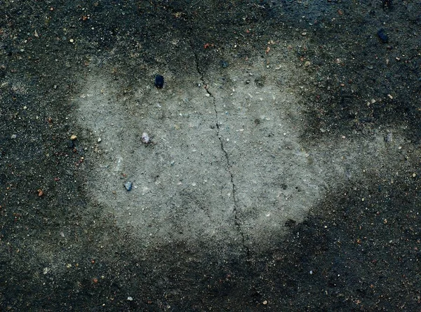 Fondo abstracto hecho de pequeñas piedras negras — Foto de Stock