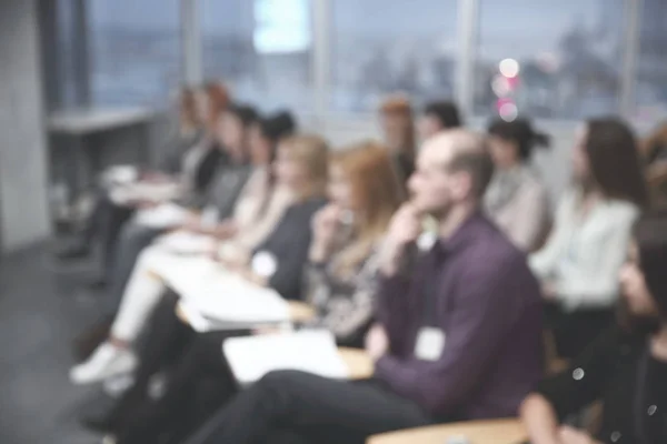Close up.blurred imagem dos alunos na sala de conferências — Fotografia de Stock