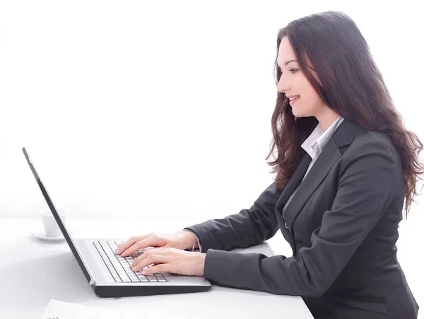 Side view.business woman typing on a laptop. — Stock Photo, Image