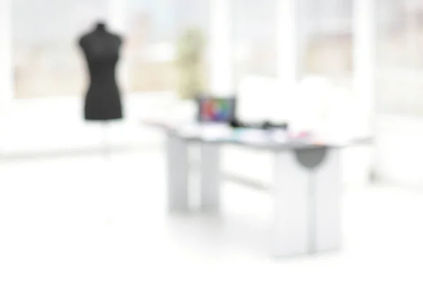 blurred image Atelier of designer clothes .photo with copy space