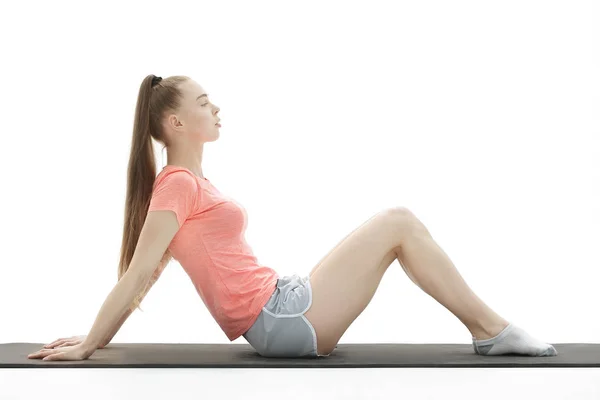 Fitness woman doing exercise to strengthen the abdominal muscles — Stock Photo, Image