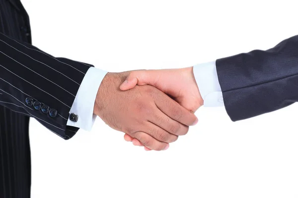 Close seup.handshake international business partners.isolated on a white — стоковое фото