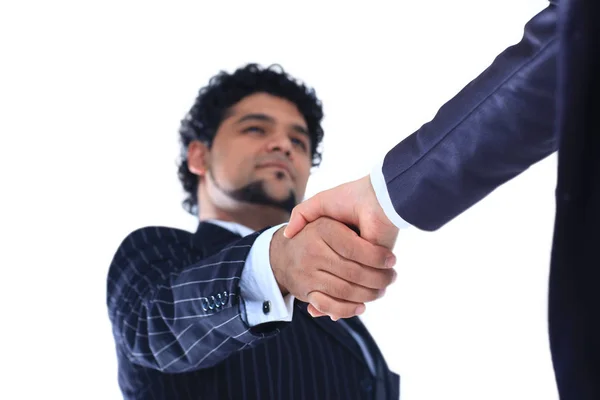 Handshake confiante parceiros de negócios internacionais.isolado em um branco — Fotografia de Stock