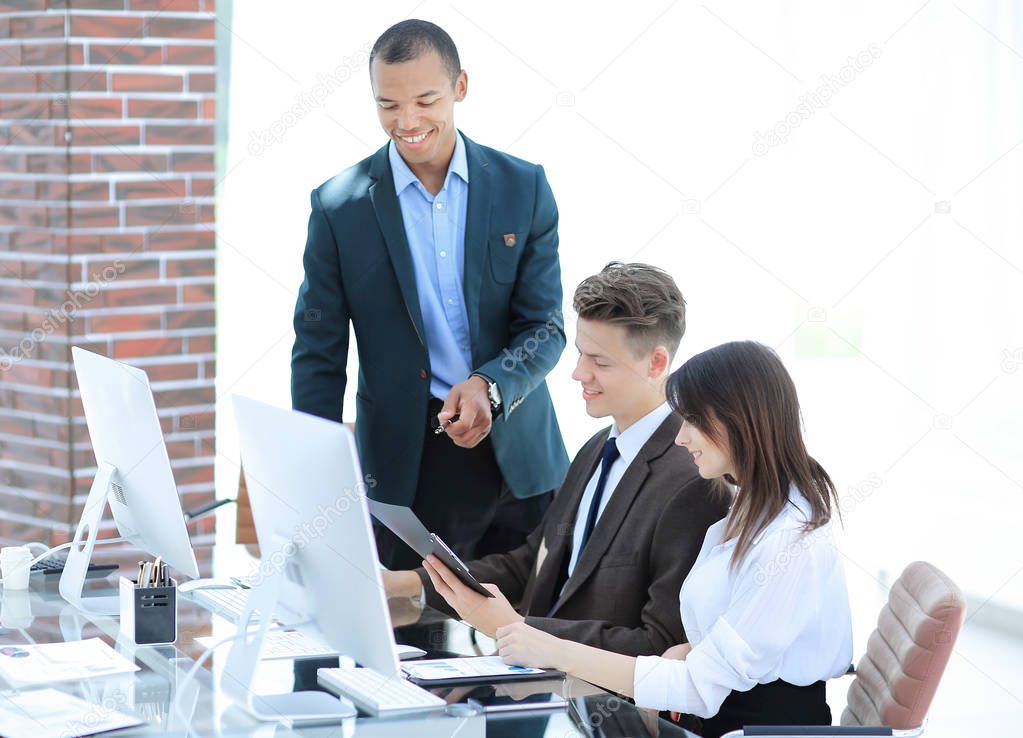 business team working with documents in a modern office.
