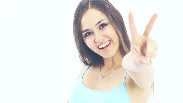 Beautiful young woman posing and showing two thumbs up — Stock Photo, Image