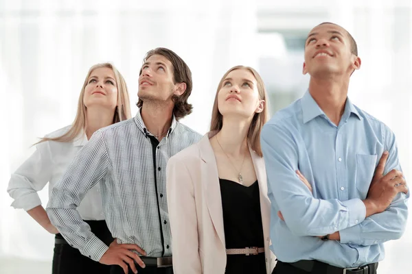 Young business team looking at copy space — Stock Photo, Image