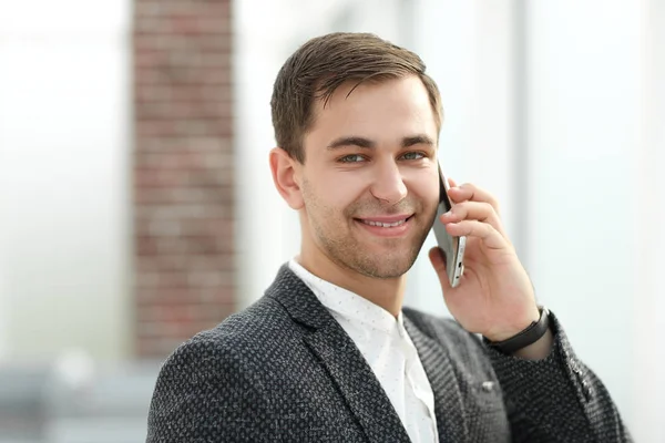 Close up. Executive businessman talking on mobile phone — стоковое фото