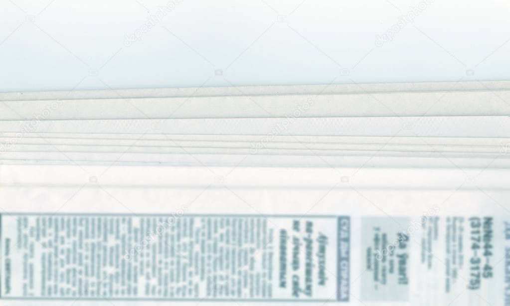 stack of old Newspapers. isolated on white background