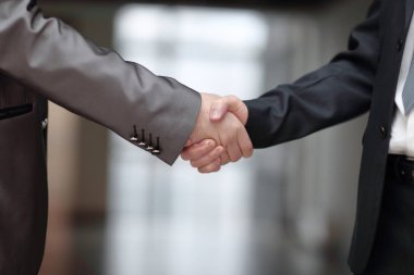 İş ortakları ofis ve arka plan üzerinde yakın up.handshake