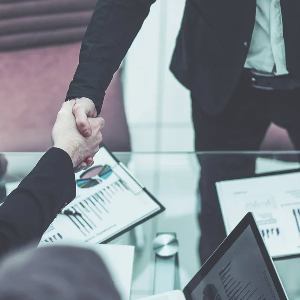 Handshake business partners after discussion, the financial sche — Stock Photo, Image