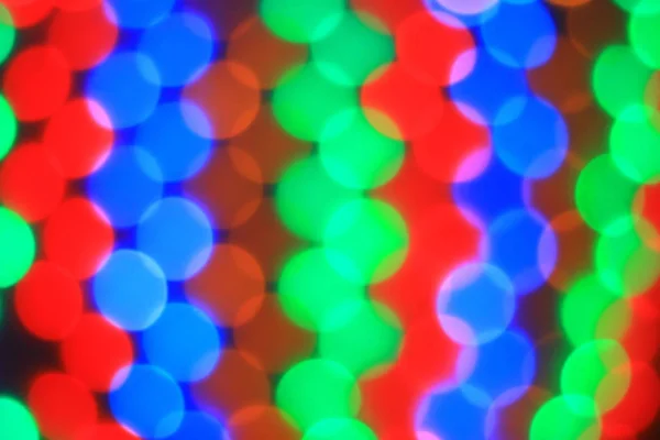 Imagen borrosa de luces coloridas.Fondo de Navidad. concepto de vacaciones —  Fotos de Stock