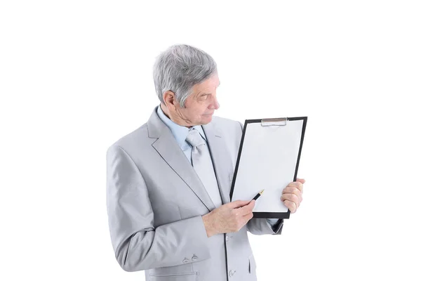 Mature businessman pointing at blank sheet.isolated on a white — Stock Photo, Image