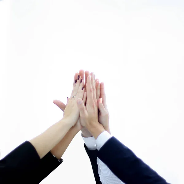 Close up. business team giving each other a high five — Stock Photo, Image