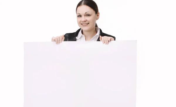 Young woman employee of the company holding a blank banner — Stock Photo, Image