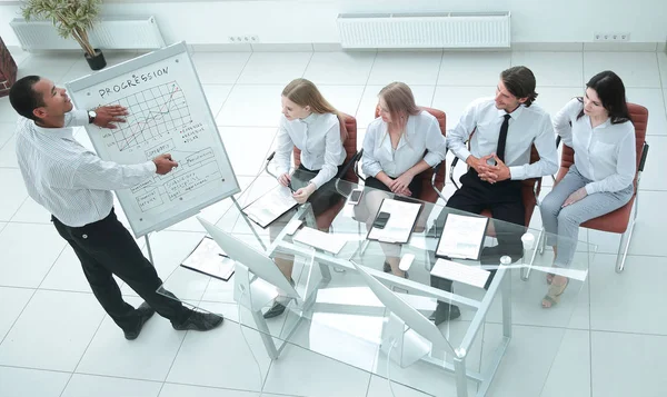 Top view.business team at presentation of a new financial project. — Stock Photo, Image