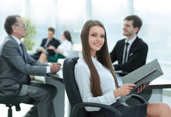 Executive business woman with clipboard modern office