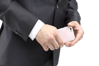 yakın çekim. beyaz bir smartphone.isolated tutan işadamı