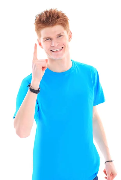 Foto van aantrekkelijke jonge man met haar vinger omhoog. geïsoleerd op wit. — Stockfoto