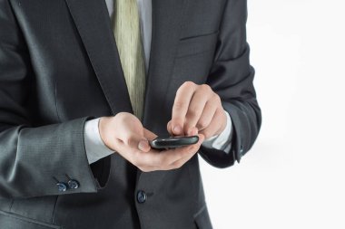 yakın çekim. SMS Smartphone'da tipik iş adamı