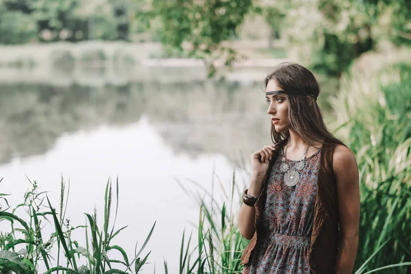 Beautiful hippie girl on spring forest background — Stock Photo, Image