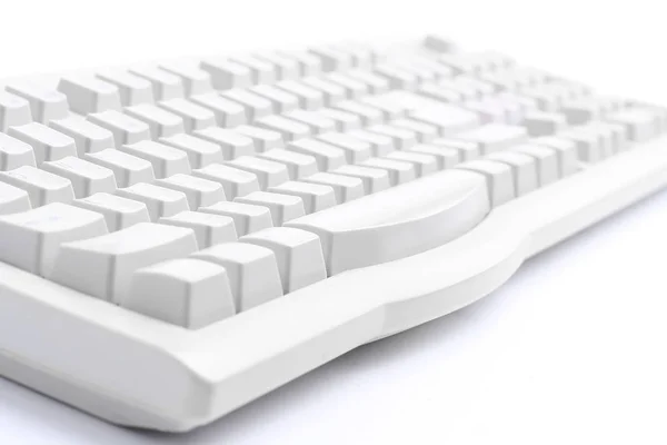 Primer plano .el teclado viejo sobre un fondo blanco . — Foto de Stock