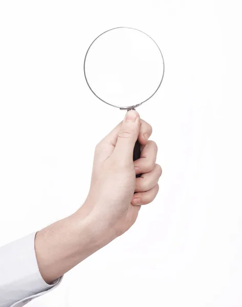 Closeup of a businessman holding a magnifying glass — Stock Photo, Image