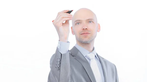 Серьезный бизнесмен указывает маркером на виртуальные пуанты — стоковое фото