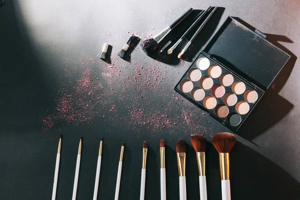 professional makeup set isolated on black background