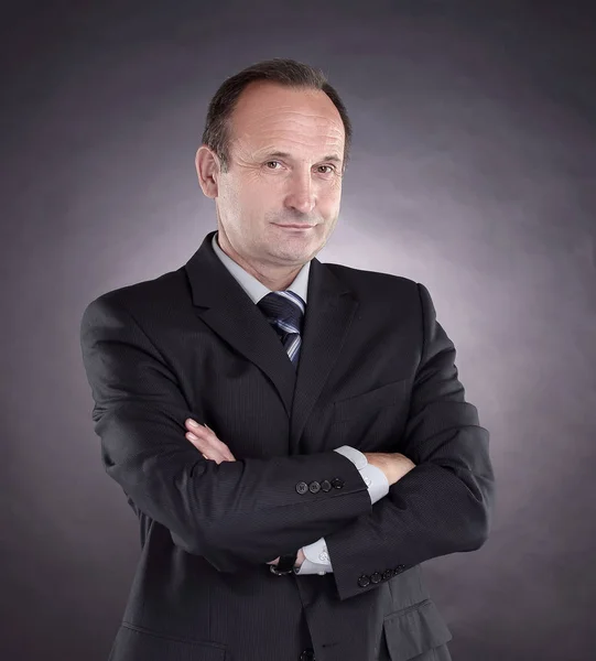 Portrait of a confident businessman. photo on black background — Stock Photo, Image