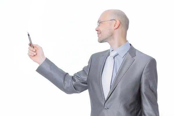 In full growth.handsome businessman pointing at a copy space. — Stock Photo, Image